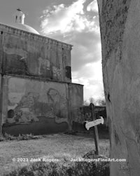 a black and white photo of an old church